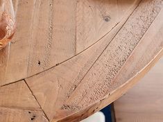 a wooden table with plates and glasses on it