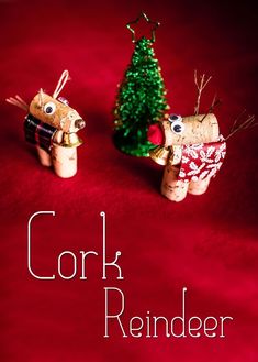 two cork reindeer ornaments sitting next to each other on a red background with the words cork reindeer