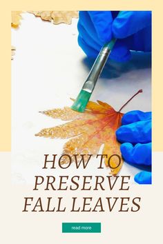 a person in blue gloves holding a leaf with the words how to preserve fall leaves