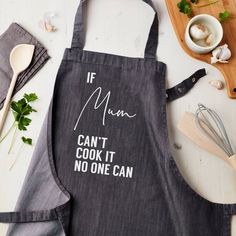 an apron with the words if man can't cook it, no one can