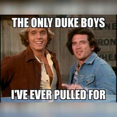 two men standing next to each other in front of a sign that says, the only duke boys i've ever pulled for