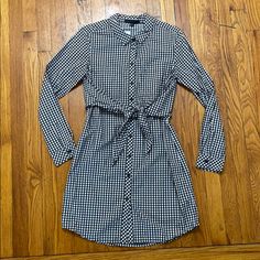 Blk/White Plaid. Full Button Closure With Collar And Front Tie Straps. 2 Front Pockets On Chest Measurements: Collar 5”X5” / Shoulder To Shoulder 16” / Shoulder To Sleeve 23” / Pit To Pit: 16.5” / Pit To Bottom 24” Plaid Button Dresses For Day Out, Plaid Button Dress For Day Out, Plaid Button-up Dress For Day Out, Bell Sleeve Shift Dress, Floral Dresses Short, Long Sleeve Wrap Dress, Tent Dress, Black Long Sleeve Dress, Simple Shirts