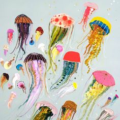 an image of jellyfish in the water with different colors and patterns on it's body