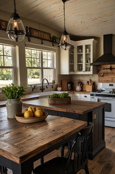 a kitchen with an island, stove and sink in it's centerpieces