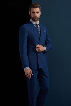 This blue suit for men or women is an amazing addition to any new suit wardrobe and a great enhancement to established suit wardrobes. With the neutral and bold blue color, you will not only be seen as a leader, but you will be able to partner this suit with multiple color options for any season and any situation. This is a piece that everyone should have in their collection. Like this look, but want to make some changes? Chat with a stylist or book an appointment. FREE SHIPPING ON ORDERS OVER $199 COLOR Blue COMPOSITION 100% Wool YARN COUNT Super 100s WEIGHT 295g FABRIC STYLE Solid OCCASION Business/Casual Elegant Blue Double Breasted Suit For Semi-formal Occasions, Blue Business Casual Suits With Suit Collar, Royal Blue Notch Lapel Suits For Work, Tailored Blue Suits With Suit Collar, Blue Double-breasted Suit For Work With Suit Collar, Blue Business Casual Suit With Notch Lapel, Tailored Blue Business Suits, Blue Double-breasted Suit For Workwear, Tailored Single Breasted Blue Suit