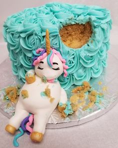 there is a cake that looks like a unicorn