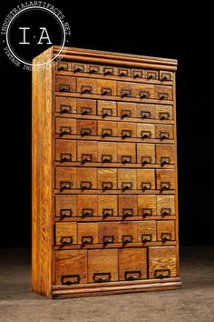 an old wooden dresser with many drawers