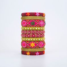 The bangle set draws inspiration from the opulent beauty of the Mughal Empire and the artistic influence of Arabian art and Islamic tradition in India's history. Each bangle reflects the grandeur of the Mughal era with intricate patterns and jewel-toned hues reminiscent of palace adornments and regal attire. These bangles are a fusion of artistic traditions, blending Persian, Central Asian, and Indian craftsmanship. As wearers adorn themselves with these bangles, they embrace a legacy of beauty Fabric Bangles, Art Arabe, Ancient Indian Art, Arabian Art, Thread Bangles, Bangles Indian, Handmade Bangles, Handmade Jewelry Designs, Bangle Designs