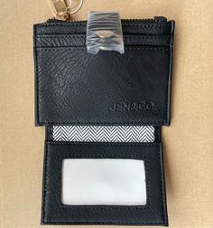 Our Megan wallet is compact and fits well into small purses or a pocket. It is a great way to store your must haves when you don't want or have space for a large wallet. Made of vegan leather by Jen & Co. Measurements: 3 3/4" x 4 3/4" Large Wallet, Small Purse, Vegan Leather, Must Haves, Wallet, Leather