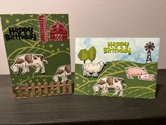 two cards with farm animals on them and the words happy birthday written in large letters