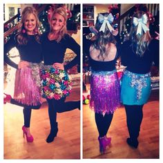 two women dressed up in different styles of sequins and skirts, one holding a purse