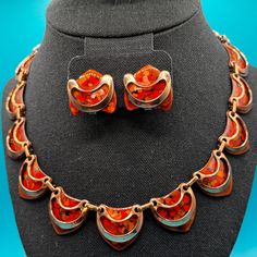 Vintage 1950's Matisse Renoir copper and enamel adjustable length necklace and clip-on earrings. Gorgeous set with beautiful on trend orange tones. Made in California. Matisse Renoir was a mid-century jewelry company from California that made Arts & Crafts inspired copper jewelry from 1946 to 1964. Orange Tones, Mid Century Jewelry, Length Necklace, Jewelry Companies, Copper Jewelry, Vintage 1950s, Clip On Earrings, Jewelry Sets, Arts And Crafts