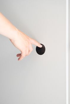 black potential-free push button in wall Push Button, Light In The Dark, Showroom, Unique Design, Essence