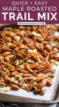 the recipe for maple roasted trail mix on a baking sheet with text overlay that reads quick and easy maple roasted trail mix