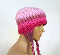 This cute pink hat is one of a kind. It has been crochet with two strands of yarn. This ensures that it is super thick and warm. It fades gracefully from light pink to darker shades. It has triangular ear flaps with tie-able tassels. One size fits most. Hand wash and lay flat to dry. Yarn may vary slightly from photo. Wear it and make a statement! Great for supporting your favorite cozy season! It has a lot of adorable charm . Great for back to school / fall ! One size fits most. For best result Cute Pink Crochet Beanie Hat, Cute Pink Crochet Beanie, Cute Hand Knitted Pink Hat, Cute Pink Hand Knitted Hats, Adjustable Pink Bonnet Hat, Adjustable Pink Crochet Hat, Adjustable Pink Crochet Yarn Hat, Adjustable Pink Hand Knitted Crochet Hat, Adjustable Pink Crochet Hat Hand Knitted