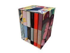 a multicolored box with many different books on it's front and back sides