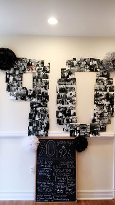 a black and white photo frame on the wall next to a chalkboard with pictures