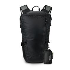 the back pack is black and has two zippers on one side, and an external pocket