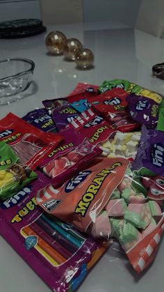 a pile of candy sitting on top of a table