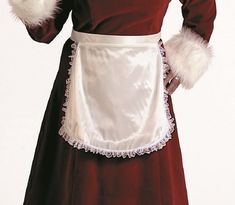 a woman wearing a red and white dress with fur trimmings on the waist