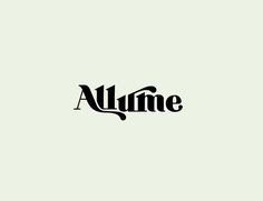 the word alumie written in black on a white background