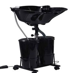 two buckets are attached to the back of a black stand with wheels and handles