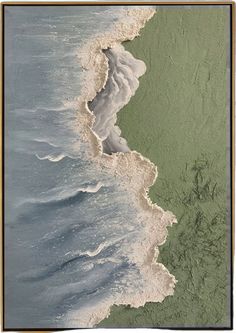 an aerial view of the ocean with waves