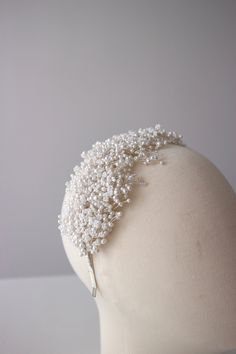 Bride pearl headband. This bridal white pearl headband is perfect for feminine, romantic, dreamy wedding. It's also a perfect choice for classic everlasting bridal look DETAILS of this bride white pearl headband: Width of this this headband: 7cm / 2.7 inches Adjustable for any of adult's head size, just like normal headband This bride white pearl headband is easy to wear - This bride white pearl headband is designed and handmade in Indonesia - This bride white pearl headband is available in white - silver  - Handcrafted  - Tarnish resistance jewelry wire - This bride white pearl headband comes in a box  All of our bridal hair accessories are made to order, please see individual item for processing time RUSH ORDERS: Please contact us if your situation requires shorter production times of th White Pearl Headband, Bridal Pearl Headband, Headband Bride, Pearl Headband Wedding, Headband Pearl, Pearl Crown, Pearl Bridal Headband, Pearl Headpiece, Bride Headband