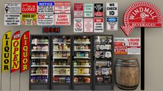 an assortment of various signs and food items displayed on a wall in front of a refrigerator