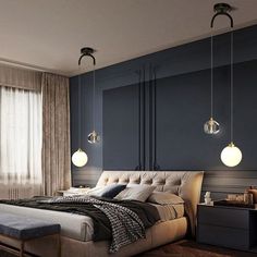 a bedroom with blue walls and wooden floors, two lamps hanging from the ceiling above the bed