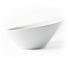 a white bowl sitting on top of a table