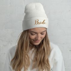 "This Bride beanie is perfect for a ski bachelorette party, flannel bridal shower or a fall honeymoon. This hat makes a perfect gift for a future bride to wear on a ski hen weekend, winter wedding or on her mountain honeymoon. Bride Beanie, Winter Wedding Gift, Gold Mrs Hat, Gift For Future Wife, Cozy Bachelorette Party prop, Bridal Shower Favor, Engagement Gift ABOUT THIS BEANIE: A snug, form-fitting beanie. It's not only a great head-warming piece but a staple accessory in anyone's wardrobe. P Bachelorette Party Props, Cute Beanies, Winter Bride, White Bride, Trendy Hat, Cuffed Beanie, Women's Beanie, Bachelorette Party Favors, Golden Girl