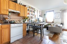 the kitchen is clean and ready for us to use in the day time, while the dining room table has been set up