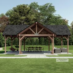 an outdoor pavilion with tables and chairs in the grass