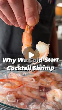 someone is dipping shrimp into a glass bowl with ice cubes on the side and text that reads, why we goldstart cocktail shrimp