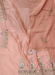 Item Overview ATHARVA Hand Embroidered Salwar Kameez Peach/Embroidered Chanderi Shirt/Zari Work Organza Dupatta/Custom Stitch Unstitch/Custom Anarkali/Gift Dno. CH1663 Fabric:  * Shirt: Chander Silk - Embroidered Border Panel/ 2.5 Mts/ Beautiful Hand Embroidery  * Dupatta: Organza Dupatta 2.5Mts/ Moti Latkans Tassels (Motifs may wary)/Exclusive Gota Patti work * Bottom Santoon Taffeta Silk 2.5 Mts. Excusive Hand Embroidered Party Wear Punjabi Suit. Customization: * Fabrics Customization: Designs Embroidered Peach Chanderi Salwar Kameez, Fitted Peach Dupatta With Resham Embroidery, Peach Resham Embroidery Dupatta, Semi-stitched Embroidered Peach Salwar Kameez, Embroidered Peach Georgette Dupatta, Patiala Salwar Kameez, Embroidered Salwar, Embroidery Dupatta, Gota Patti Work