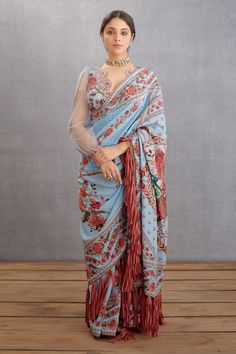 Sea blue saree in silk crepe base with chintz printed motifs and frills all-over.
Component: 1
Pattern: Printed
Type Of Work: Chintz Motifs
Fabric: Silk Crepe
Color: Blue
Other Details: 
Fringe hem saree
Note: The blouse and scrunchie worn by the model is not for sale
Occasion: Wedding - Aza Fashions Sea Blue Saree, Chintz Motifs, Silk Crepe Fabric, Blue Saree, Indian Fashion Designers, Saree Online, Silk Organza, Sea Blue, Printed Sarees