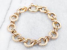 This sophisticated bracelet offers a timeless style perfect for any occasion. Crafted with a luxurious yellow gold, it secures with a chunky spring ring clasp for a comfortable fit.Metal: 14K Yellow GoldWidth: 12.9 mmLength: 7 3/4 InchesMarks: "585 14K()()ITALY" Stamped on the clasp Bracelet Layering, Rope Ring, Rope Rings, Spring Bracelet, Fine Silver Jewelry, Yellow Gold Bracelet, Layered Bracelets, Pearl Pendant, Chain Link Bracelet