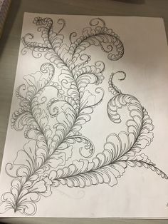 a piece of paper with an intricate design on it