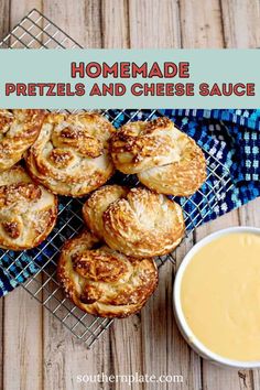 homemade pretzels and cheese sauce on a wire rack with a bowl of dip