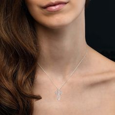 A perfect expression of faith and beauty - this Angel Pendant features 1/4 carat of lab grown diamonds of F-G color and VS-SI clarity in a stunning 16-inch chain with two-inch extension and lobster clasp. A beautiful keepsake fit for any occasion. The Sku number is 453896 Product Details Chain: 16 inch with 2 Inch extension Clasp: Lobster IL Certificate is available upon request. Wings Pendant, Angel Necklace, Angel Pendant, Diamond Cross Pendants, Diamond Cross, Gold Cross, Diamond Pendant Necklace, Lab Created Diamonds, Diamond Pendant