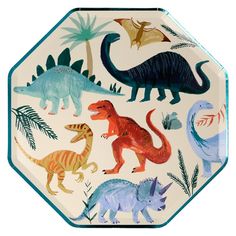 a paper plate with dinosaurs and plants painted on it's sides, in the shape of hexagonal shapes