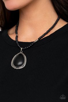 An oversized black stone teardrop is pressed into the center of an ornate silver frame that is studded and stamped in tribal inspired patterns. The rustic pendant glides along an earthy strand of black stone and antiqued silver beads below the collar for a seasonal finish. Features an adjustable clasp closure. Sold as one individual necklace. Includes one pair of matching earrings. Black Jewelry Necklace, Paparazzi Accessories, Black Necklace, Paparazzi Jewelry, Black Stone, Silver Frame, Necklace Earring Set, Stone Necklace, Matching Earrings