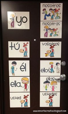 a door decorated with spanish words and pictures for children to use on the front door