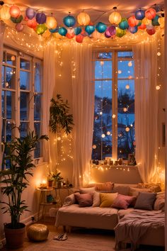 a living room filled with lots of lights next to a large window covered in curtains