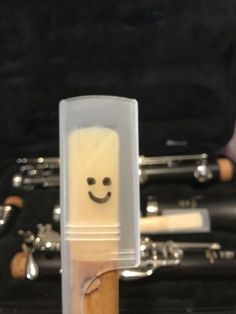 a close up of an instrument with a smiley face on it