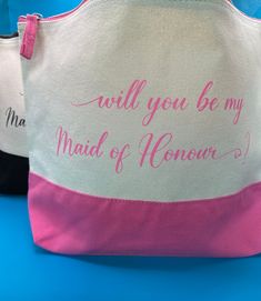 two bags with the words will you be my maid of honor?