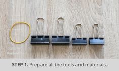 the tools are lined up on the table to be used for making paper clips and pencils