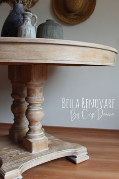 a wooden table with two vases on top of it and the words bella renoovare diy crafts