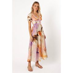 Unleash your inner fashionista in our vibrant, Christoff dress. With its alluring deep V-neckline and keyhole cut-out, you'll be turning heads and making a style statement. The A-line skirt design twirls to your rhythm, while the back shirred panel adds a fetching touch of detail. V-neck Cutout Maxi Dress For Brunch, Spring Vacation Maxi Dress With Cut-out Waist, Summer Brunch Maxi Dress With Cut-out Waist, Summer Midi Dress With Notched Neckline For Brunch, Summer Vacation Midi Dress With Cut-out Waist, Summer Midi Dress With Cut-out Waist For Vacation, Summer Midi Dress With Cut-out Waist For Brunch, V-neck Cutout Dress For The Beach, V-neck Cutout Dress For Beach